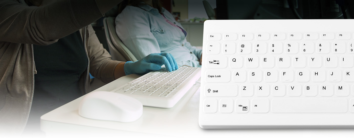 white CK keyboard in use at a medical facility